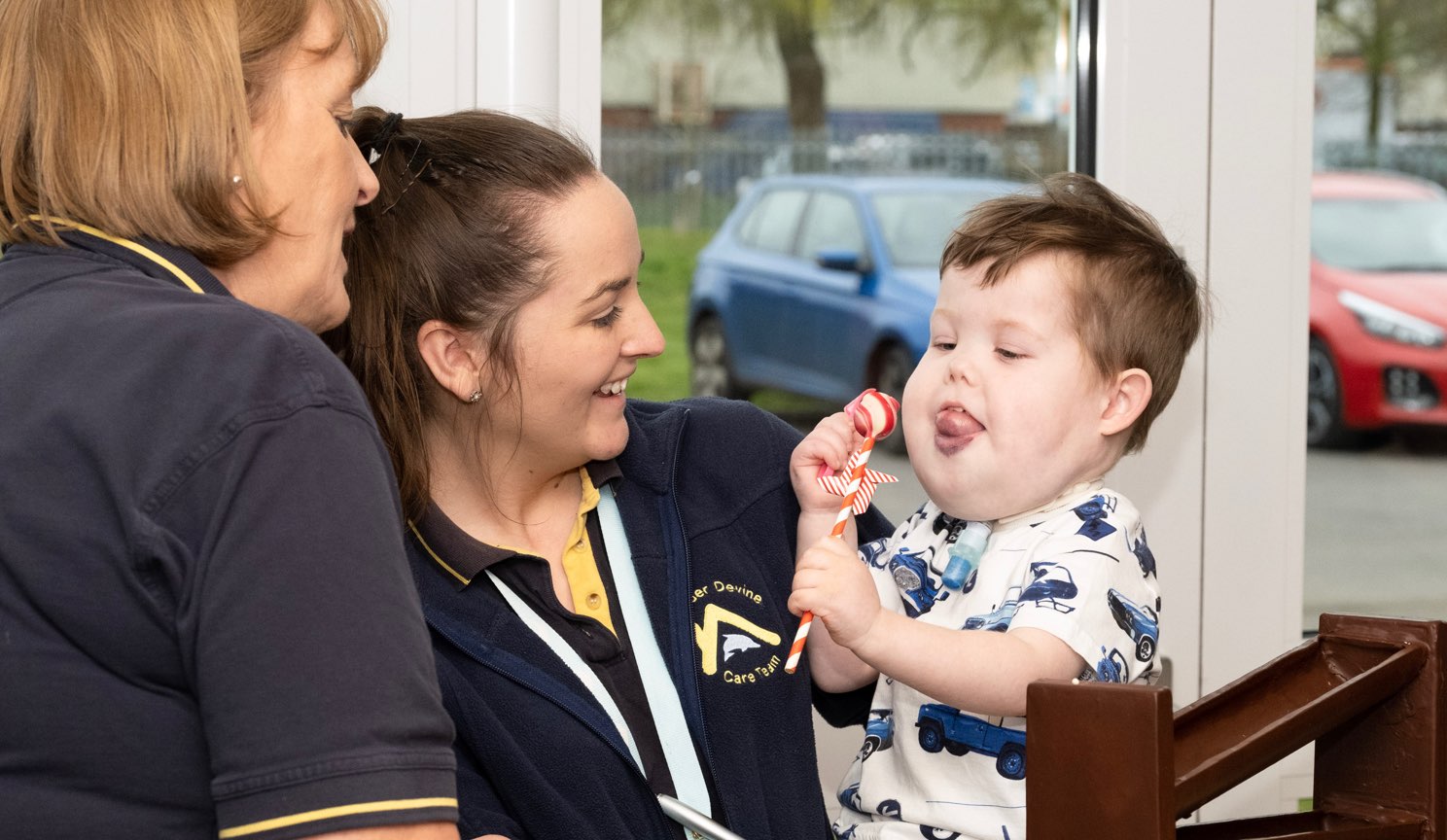 Alexander Devine care team with little boy.