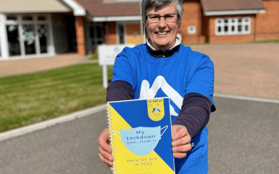 Volunteer writes new poetry book for charity