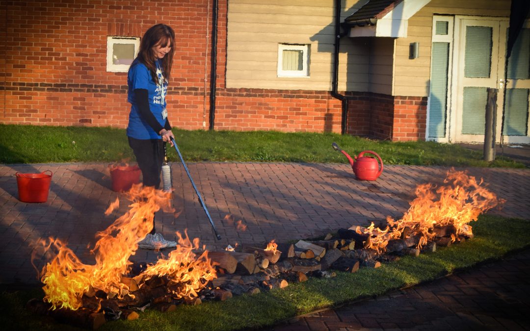 Step into the Heat: Join Arlington Park’s Firewalk for Alexander Devine 