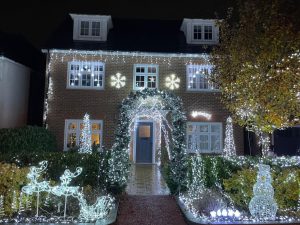 House lit up with Christmas lights.